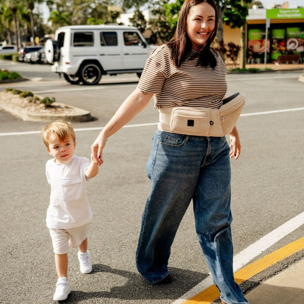 Sand Velvet HipSurfer worn as a bum bag on the school run with a toddler